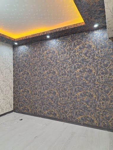 Wallpaper & PVC Paneling work by Lasani Interior Decor